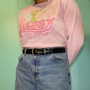 A baby pink Disney Sassy Tinkerbell sweatshirt